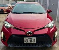Neat Red Toyota Corolla 